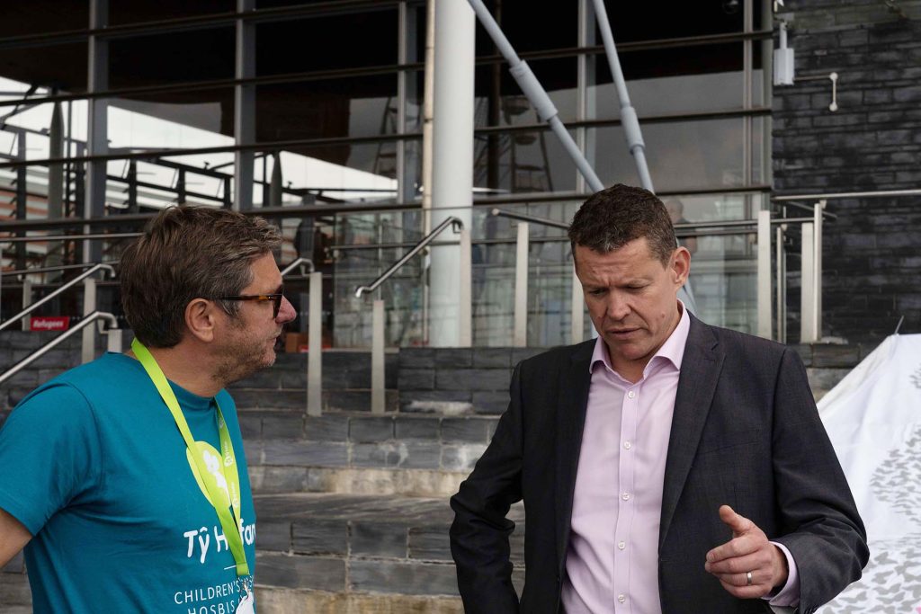 Irfon Rees talks to Rhun ap Iorwerth, Leader of Plaid Cymru outside the Senedd 18 June 2024