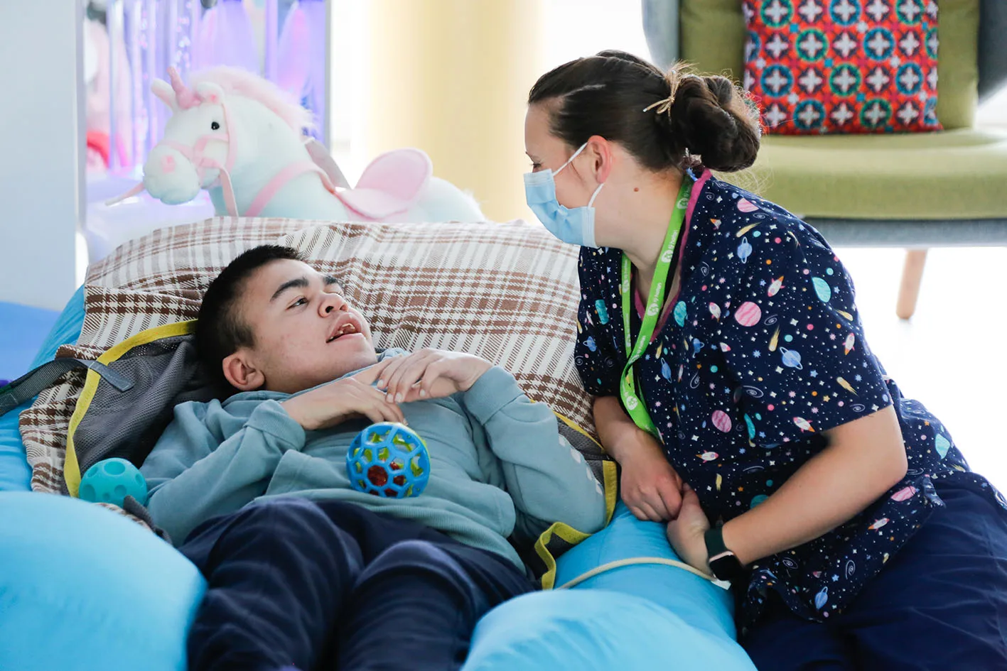 Registered nurse Emma cares for Marshall at Ty Hafan Children's Hospice