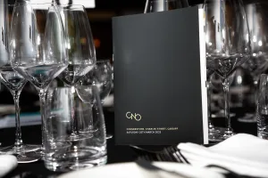 Glass on the table plus menu for Chefs' Night Out 2023