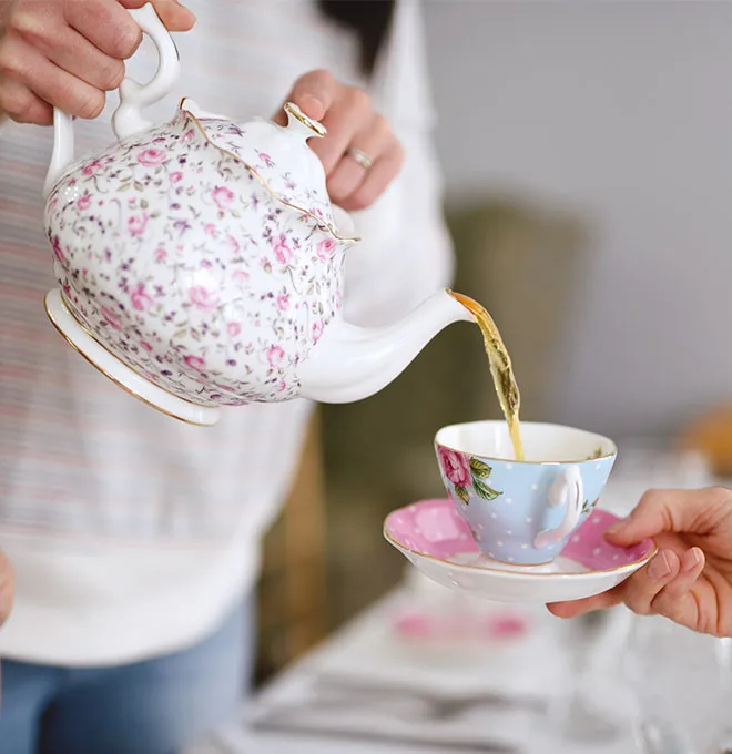 tea being poured into a tea pot