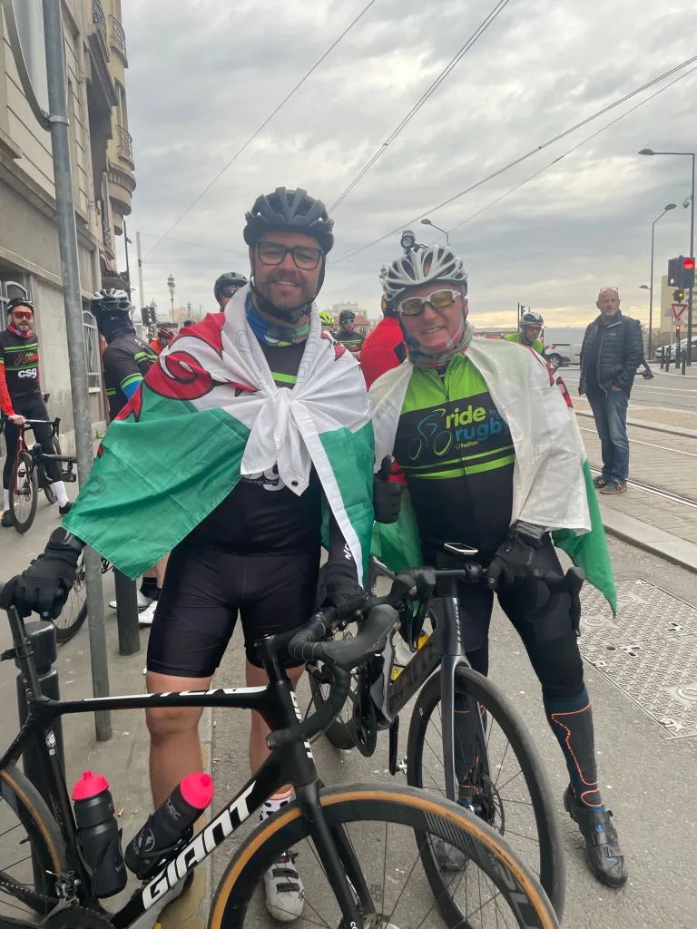 Ride to the Rugby duo with Welsh flag