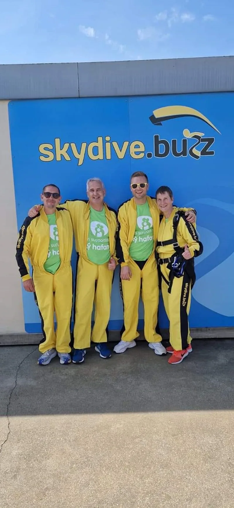 Watts team in skydiving jumpsuits