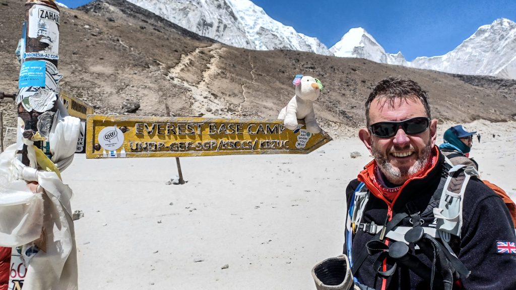 Paul Fears with Snowdog on Basecamp sign