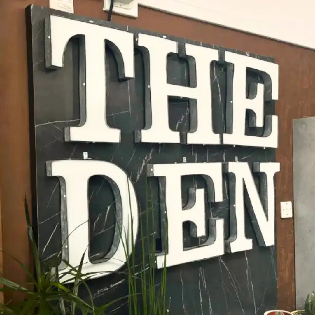 A photo of the den sign