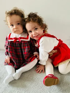 Ivy-Mai and Willow-Rae bit for the camera in matching outfits